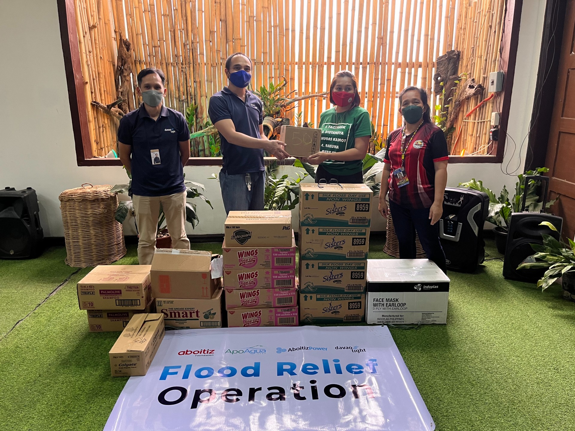 Several municipalities in Davao del Norte receive flood relief and vaccination support from Davao Light