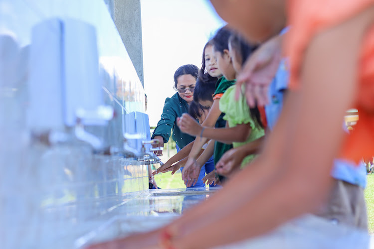 Hedcor masonry scholars construct youth hand washing facility