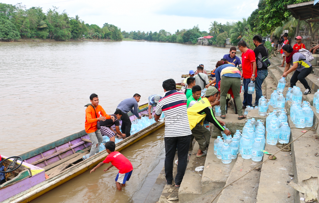Aboitiz, Mindanao electric cooperatives distribute 4000 relief packs to flood victims